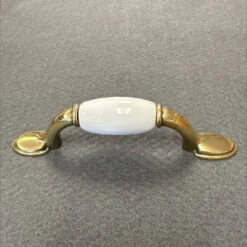 Liberty 3" Spoon Foot Pull Antique Brass With White Ceramic Insert