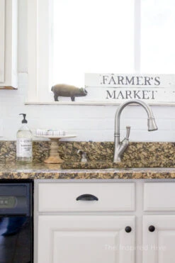 1-1/4" Country Store Knob Flat Black 25 1-1/4" Country Store Knob Flat Black -D'Lawless Hardware Shop farmhouse kitchen with black knobs 1 78151.1649080590